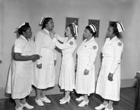 Nurses receiving pins